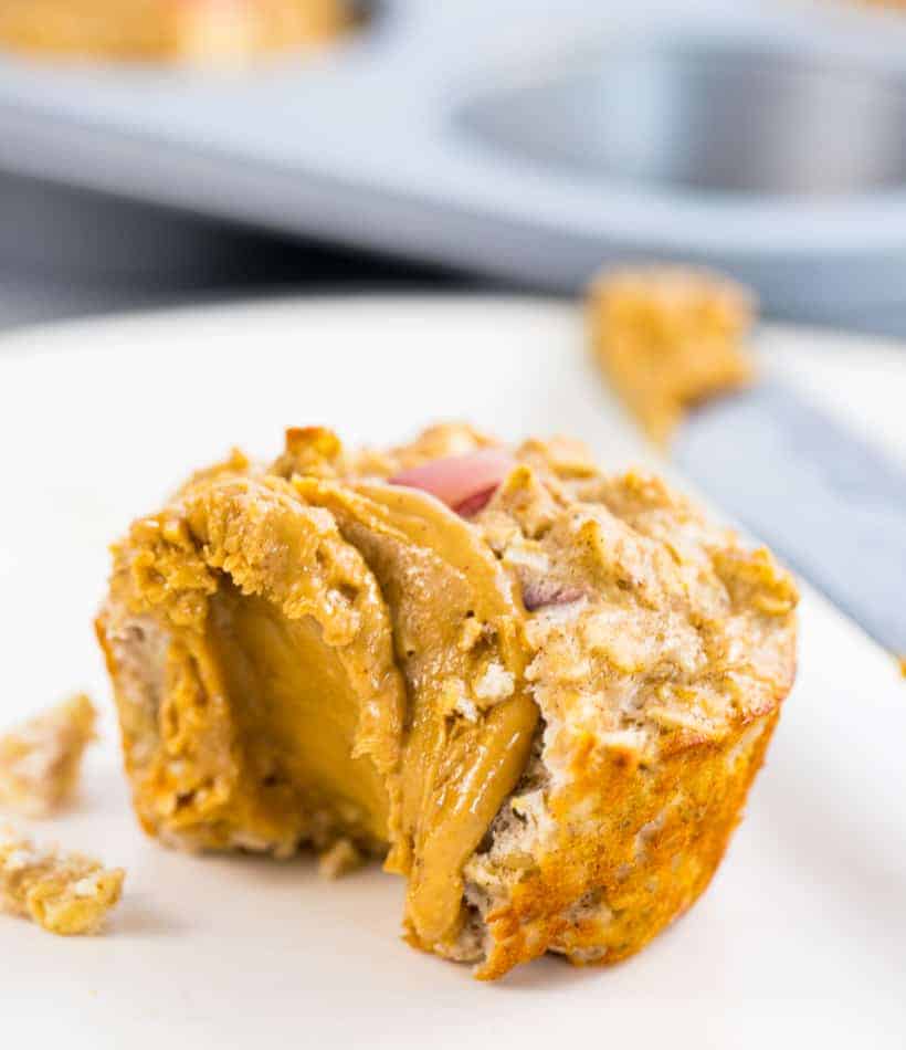 apple muffin with a schemer of almond butter spread