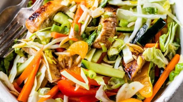 Asian Chicken Salad in a large white bowl.