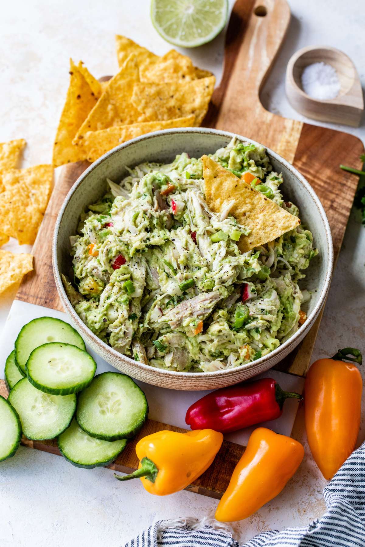 Avocado chicken salad served with tortilla chips and freshly cut veggies.