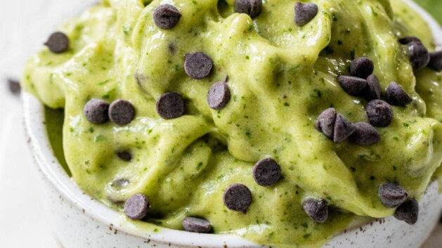 Mint chip ice cream in a white bowl.