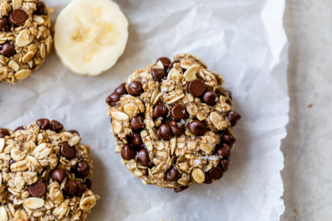 freshly baked banana oat cookies on baking sheet