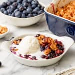 warm blueberry crisp with vanilla ice-cream