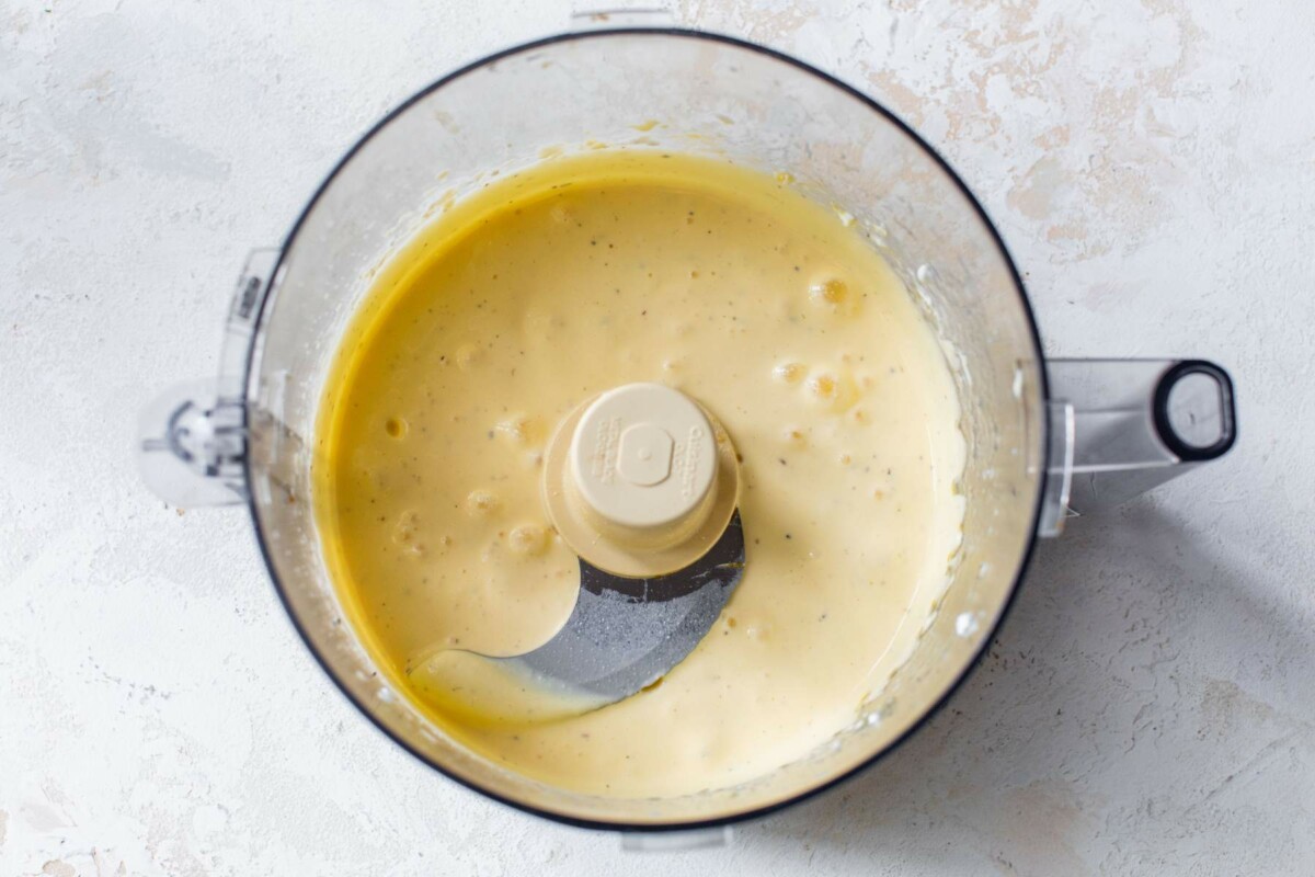 Eggs blended with cottage cheese in a food processor.