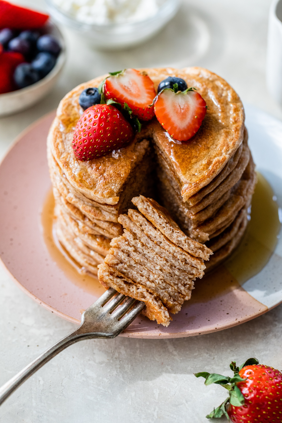 Cut cottage cheese pancakes on a plate 