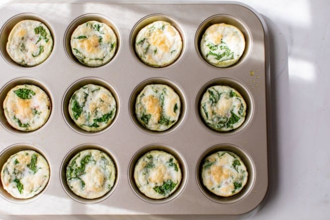 cooked egg white muffins in a muffin pan