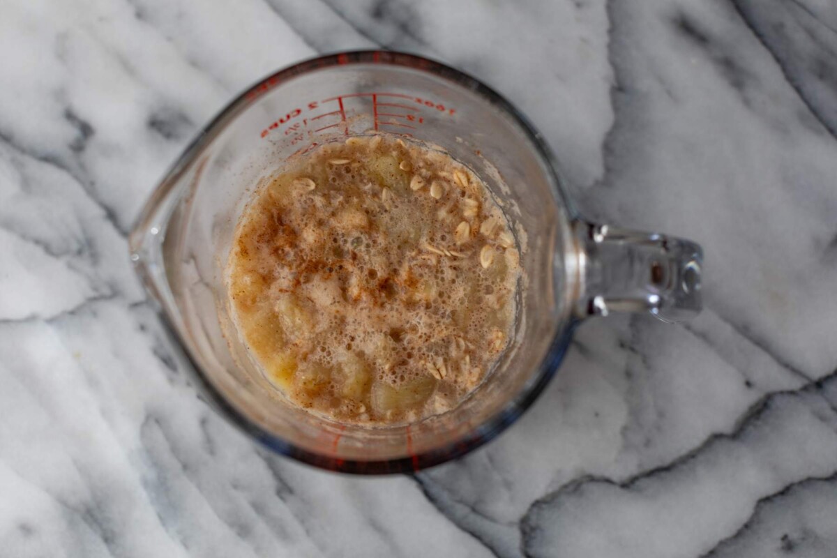 Cooked oats with banana chunks and cinnamon.