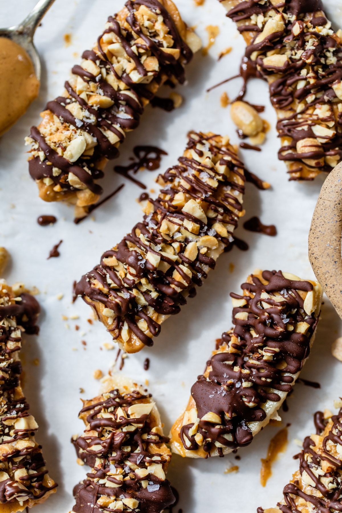Frozen bananas drizzled with chocolate.