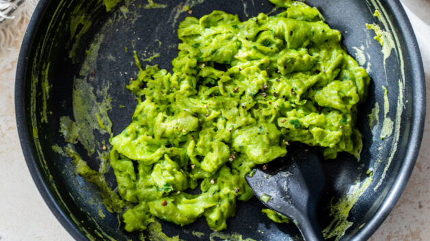 green eggs scramble in a non-stick skillet