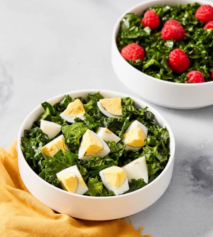 kale salad with eggs and berries