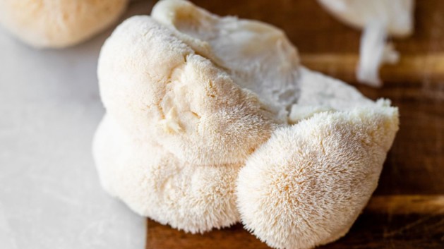 Lion's Mane Mushrooms on a cutting board.