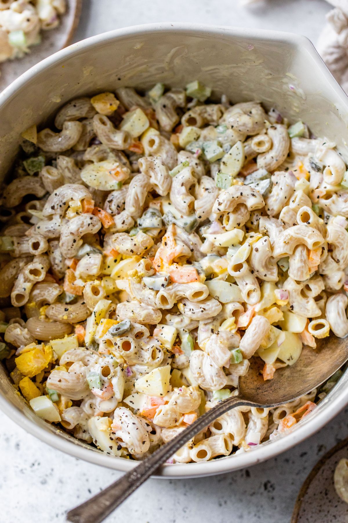 Macaroni salad served in a large bowl.