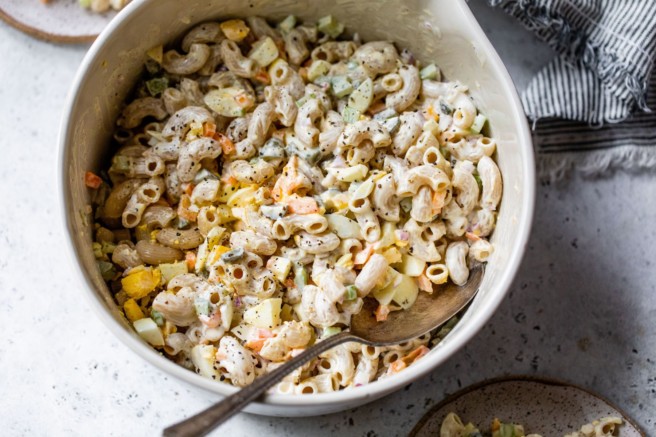 Creamy macaroni salad in a large bowl.