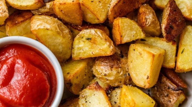 oven roasted potatoes served with ketchup