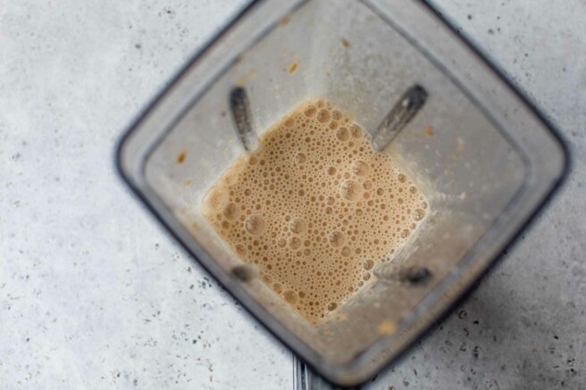 Liquid egg mixture blended in a blender.