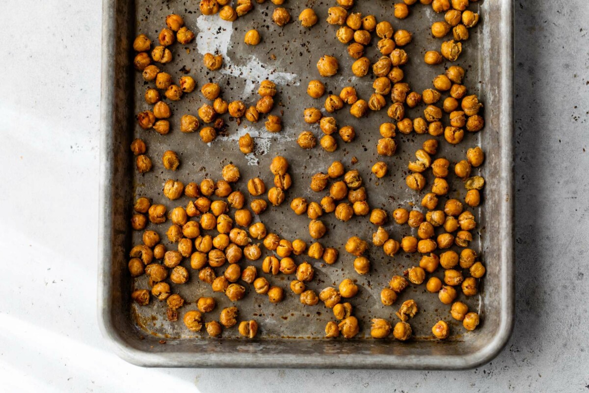 Roasted chickpeas on a sheet pan.