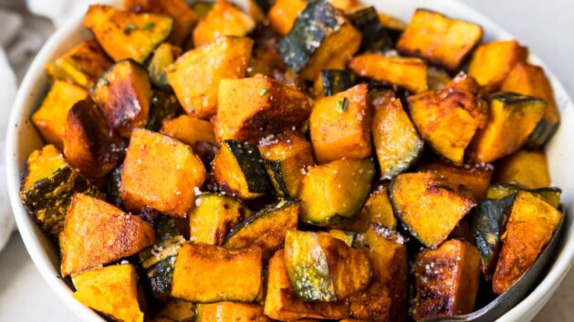 Roasted kabocha squash in a white bowl.