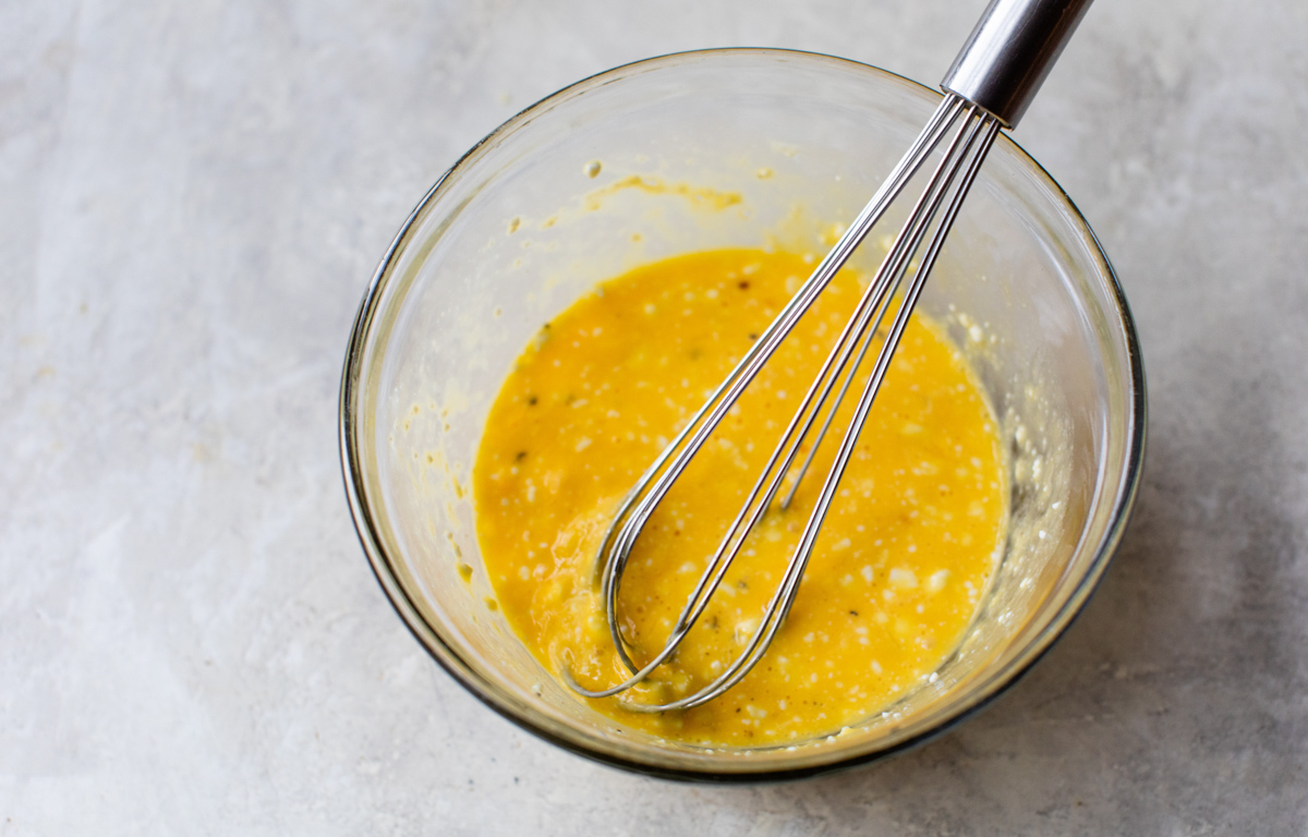 eggs, cottage cheese, salt, pepper all whisked together in a glass bowl before cooking