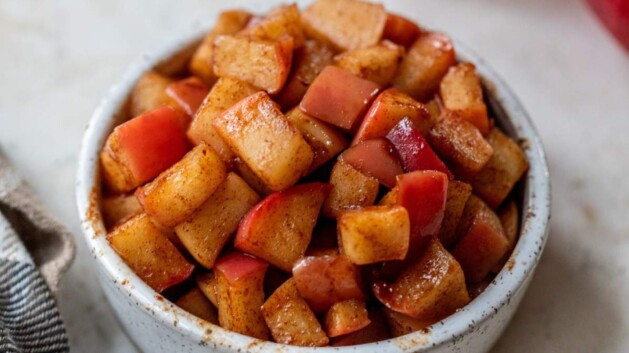 Stovetop cinnamon apples in a small bowl.