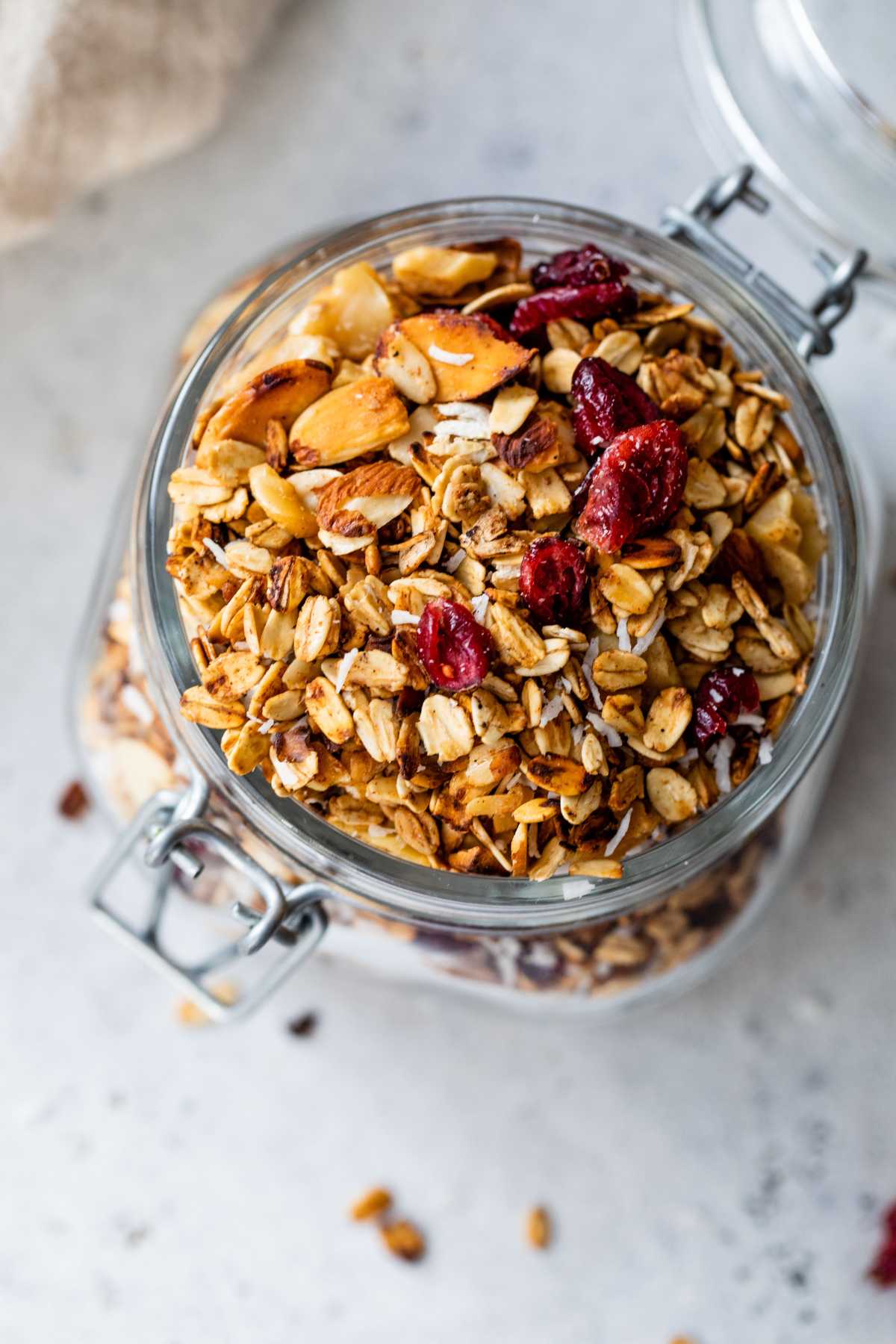 Overhead view of granola in a mason jar.