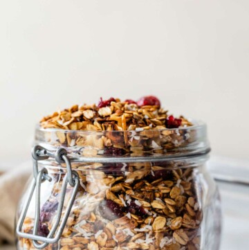 Granola in a glass mason jar.