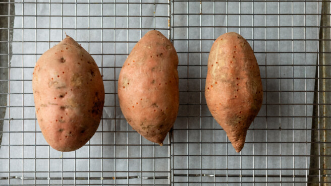 sweet potato with holes poked in from a fork