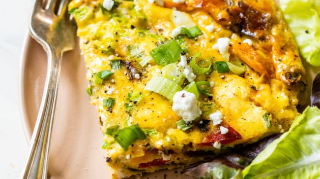 vegetable frittata cut on a plate